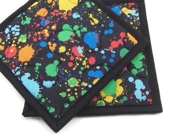 Colorful Hot Pads, Quilted Pot Holders - Color Splatters on Black Kitchen Potholders Set of Two 8 Inch Square