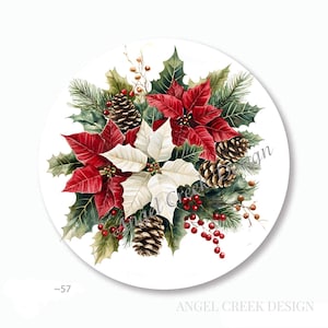 May include: A round, watercolor design featuring red and white poinsettias, green holly leaves, pine cones, and red berries. The design is on a white background and includes the text "ANGEL CREEK DESIGN".