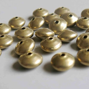 100 perles en laiton brut, perles intercalaires 9,5 mm x 5,5 mm - F195