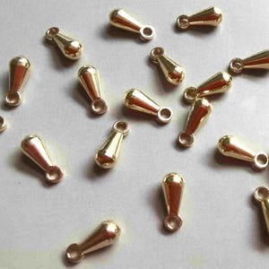 200 breloques en forme de larme en laiton brut massif 7 mm x 3 mm - F101