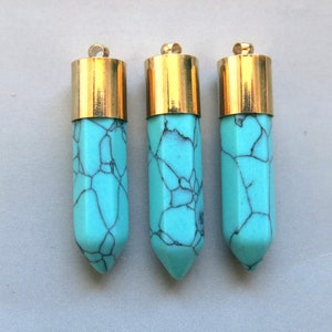 Turquoise Bullet Point With Raw Brass Cap Pendent