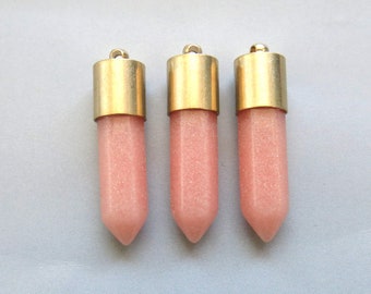 Synthetic Rhodochrosite Bullet Point With Raw Brass Cap Pendant