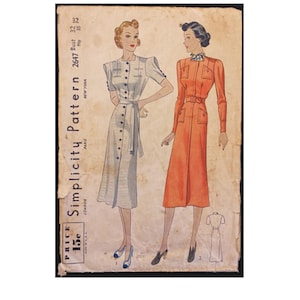 May include: A vintage Simplicity sewing pattern for a dress, featuring two women wearing different styles of the dress. The pattern number is 2647 and the price is 15 cents. The dress on the left is light blue with white buttons and a belt, while the dress on the right is orange with a belt and pockets.