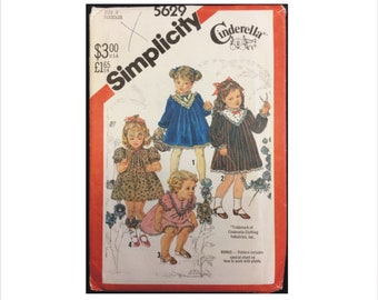 Uncut 1980s Size 2 Breast 21 Girls Front Yoke Ruffled Dress Simplicity 5629 Vintage Sewing Pattern 80s Cinderella Toddler
