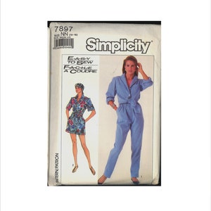 May include: A Simplicity sewing pattern for a jumpsuit with a tie waist. The pattern is for sizes 10-16. The pattern cover shows a model wearing a blue jumpsuit and a second model wearing a floral print jumpsuit.