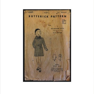 May include: Vintage sewing pattern for a little girl's coat. The pattern is for size 6 and has a 24-inch bust. The pattern includes instructions for a double-breasted coat with raglan sleeves. The pattern is from the Delineator style and includes the New Deltor.