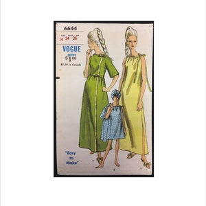 May include: A vintage sewing pattern for a long, sleeveless dress with a tie at the neck. The pattern is for sizes 14, 34, and 36. The pattern is called "Vogue" and costs £100. The pattern is labeled "Easy to Make".