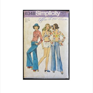 May include: A vintage sewing pattern for a women's outfit. The pattern is for a size 12, bust 34, and is designed by Effie Low Buss. The pattern shows three different styles of clothing: a red and white striped shirt with blue bell bottoms, a white halter top with white shorts, and a floral print top with blue and white striped pants.