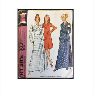 May include: A sewing pattern for a long robe with a wrap style. The pattern is for misses' and women's sizes 12-14 and has a bust measurement of 34-36 inches. The pattern is called McCall's 3031 and costs $1.00.