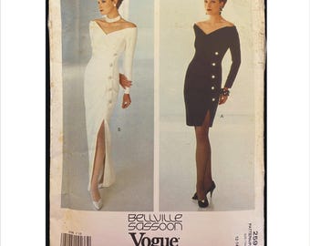 May include: A vintage Vogue Patterns sewing pattern featuring two dress designs. One dress is white with long sleeves and buttons, the other is black with buttons. The pattern is labeled "Bellville Sassoon" and "Designer Original".