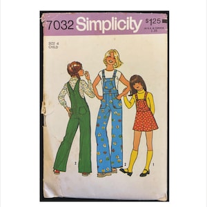 May include: Vintage Simplicity sewing pattern 7032 for children's clothing. The pattern features illustrations of three children wearing different outfits, including overalls and a dress. The pattern cover is purple and white.