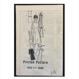 May include: A vintage printed pattern for dresses, featuring various dress designs and a central illustration of a woman. The text "Printed Pattern" is prominently displayed, along with the number "9111" and the word "SIZE". The background is a light beige.