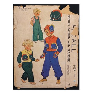 May include: Vintage McCall sewing pattern for a boy's snow and play suit. The illustration shows three different outfits, including overalls and a snowsuit. The pattern includes the text "PRINTED PATTERN with TRANSFER" and the number "1437".