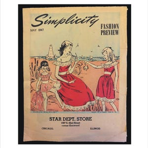 May include: Vintage "Simplicity" fashion preview cover from May 1947. The illustration features three women in red dresses with white lace trim, set against a beach scene. The Star Dept. Store logo is at the bottom.