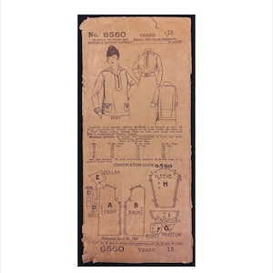 May include: A vintage sewing pattern for a shirt, labeled "No. 6560, Years 18". The pattern includes instructions for constructing a collar, sleeve, front, back, pocket, and pocket lap. The pattern is printed on a brown paper background.