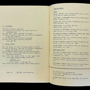 May include: Open book pages with text, featuring sections on evaluating stitches and a list of publications. The pages are off-white with black text. The book is open on a black surface.