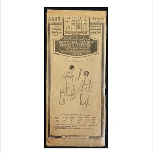May include: Vintage sewing pattern titled "The New Simplified Pictorial Review Printed Pattern." The pattern features illustrations of dresses and includes measurements for bust, waist, and hip sizes. The pattern is printed on aged paper.