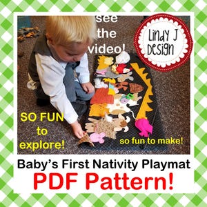 May include: A child plays with a felt playmat featuring a nativity scene. The playmat is black with yellow accents and features various animals and figures. The text "Baby's First Nativity Playmat PDF Pattern!" is displayed at the bottom of the image.
