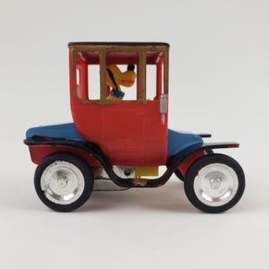 Vintage Disney Pluto Friction Car 1910 Electric Studabaker by Marx Hong Kong