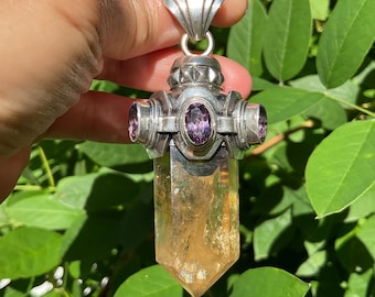 Colgante de plata de ley con citrino natural y amatista.