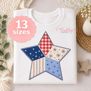 May include: White sweatshirt featuring a large, embroidered star in patriotic colors. The star is divided into sections with red and white gingham, blue with white stars, and red and white stripes. The text "13 sizes" is in a pink bubble.