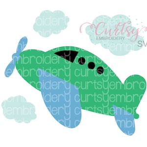 May include: A green airplane with blue wings and a propeller. The airplane is flying in the sky with white clouds.