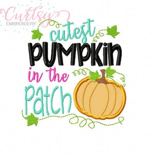 May include: Embroidered design featuring a pumpkin with the text "Cutest Pumpkin in the Patch". The pumpkin is orange and the text is in black, pink, and teal.