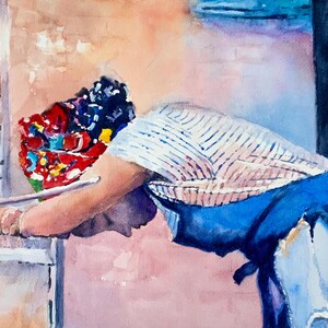 May include: Watercolor painting of a person leaning over a surface. The person is wearing a blue dress and a white and blue striped shirt. A colorful head covering is visible. The background is a soft pink and peach.