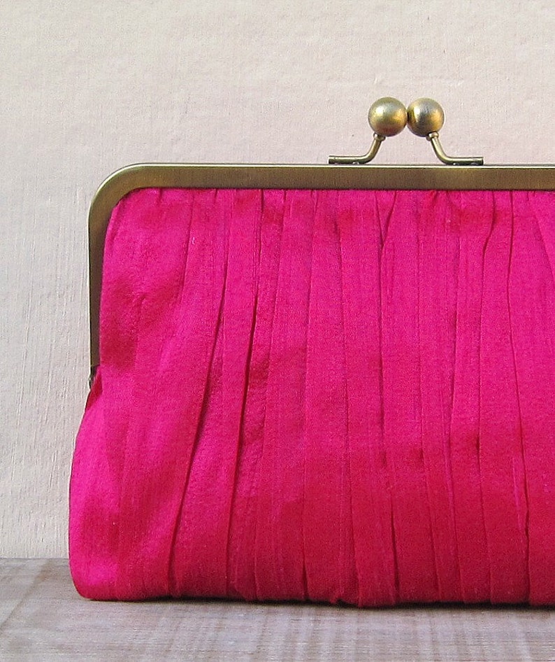 hot pink clutch bag