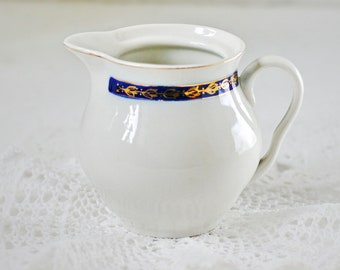 Small vintage white milk jug,  creamer