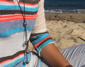 Collana di Perle di Tahiti su collana lunga Y in pelle da donna vere perle nere.