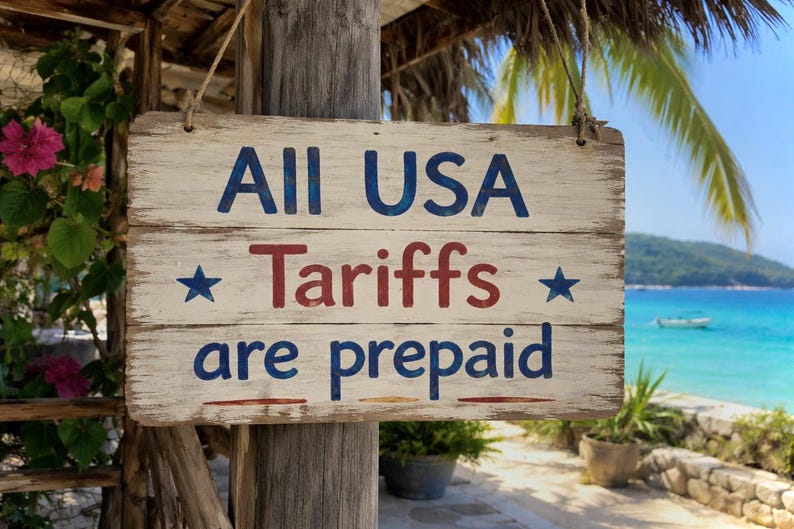 May include: Weathered wooden sign with the text "All USA Tariffs are prepaid" in blue and red lettering. The sign is hanging outdoors with a tropical beach scene in the background.