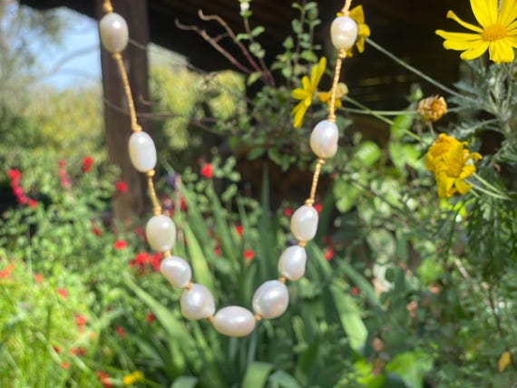 Dainty necklace of white freshwater cultured pearls dainty necklace ideal for a wedding !