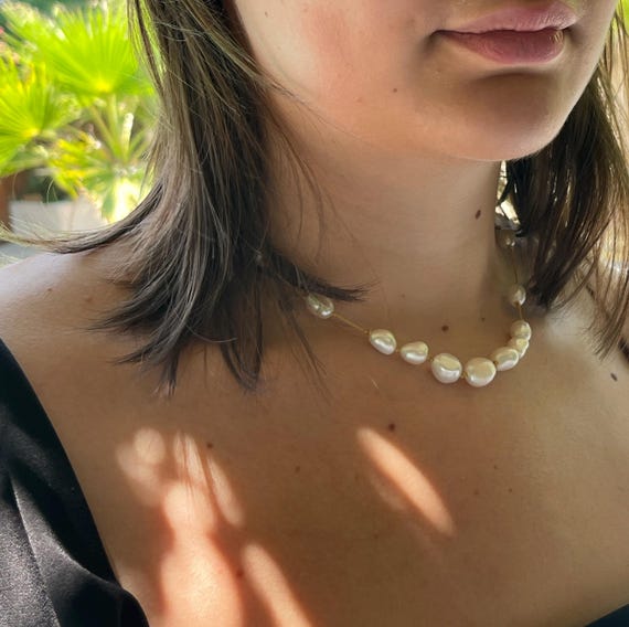 Dainty necklace of white freshwater cultured pearls dainty necklace ideal for a wedding !