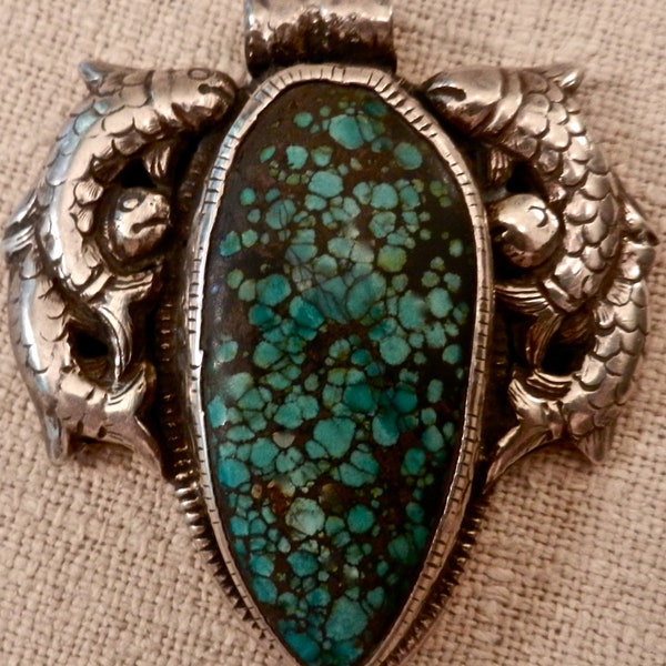 Vintage Nepalese Sterling Silver And Turquoise Pendant Made With Chasing And Repousse Techniques