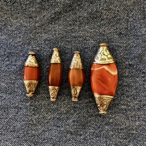 Old Tibetan Carnelian Pema Raka Bead: Coin Silver End Caps