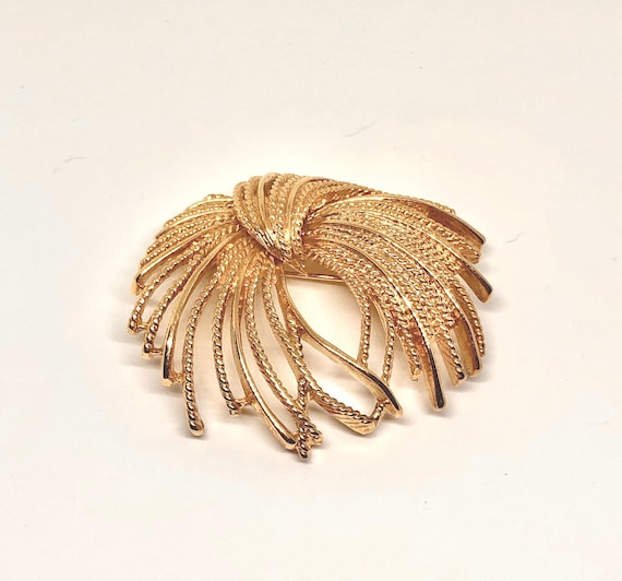 Vintage Monet Mirador Fireburst Brooch: Signed Gold Plated Book Piece