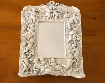 Vintage Cast White & Grey Plaster Dimensional Cherubim Framed Mirror By Gargoyle Studios, Brooklyn, NY, 11 By 8 5/8 Inches With Hanger