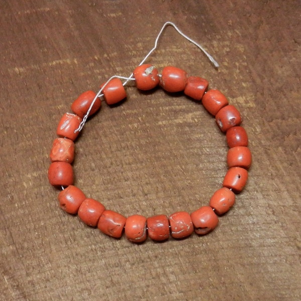 One OOAK Nine Inch Strand Of 22 Antique Red to Orange Red Meditranean Precious Red Coral Barrell Beads