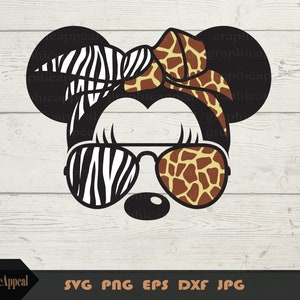 May include: A black and white zebra print and brown and tan giraffe print Minnie Mouse design with sunglasses. The bow is giraffe print and the ears are zebra print.