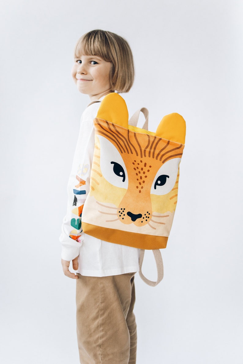 Printed Lion backpack for children with name tag image 1