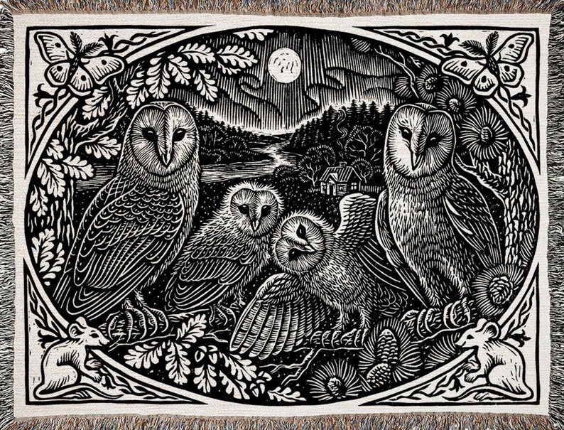 May include: Black and white woven tapestry featuring a family of owls in a forest setting. The owls are perched on branches with a full moon in the background. There are two mice in the bottom corners of the tapestry.
