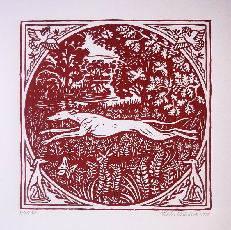 May include: A red and white woodblock print of a running dog in a forest setting. The print is framed in a square border with a floral design. The text "Valdis Basanovs 2017" is in the lower right corner.