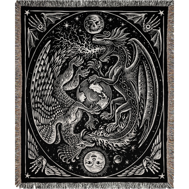 May include: Black and white woven tapestry featuring a stylized image of a dragon and a griffin facing each other. The creatures are surrounded by stars and celestial bodies, including a crescent moon and a sun. The tapestry has a black background and a woven border.