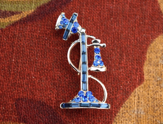1910 Candlestick Pin on a 1980s Brooch with Blue … - image 1