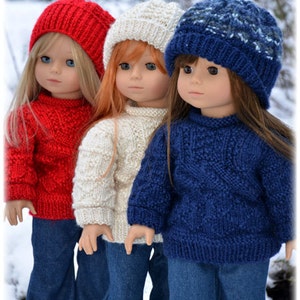 May include: Three dolls wearing knitted hats and sweaters. The doll on the left is wearing a red sweater and a red hat. The doll in the middle is wearing a white sweater and a white hat. The doll on the right is wearing a blue sweater and a blue hat. All three dolls are wearing blue jeans.