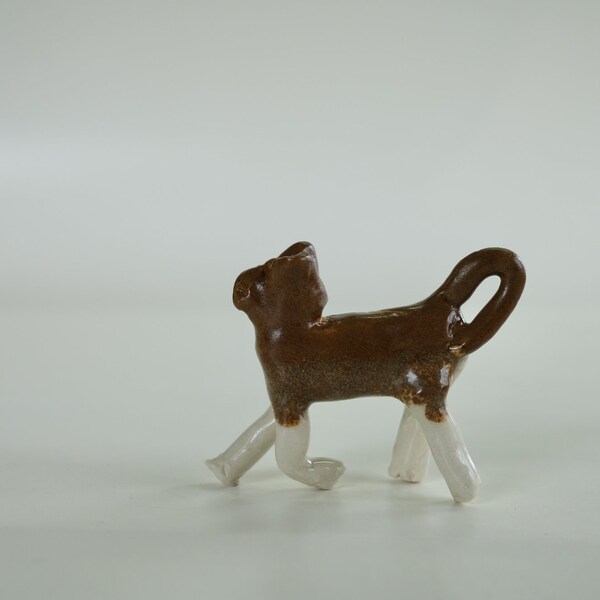 Animal sculpté miniature en céramique
