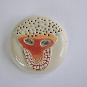 Máscara de cerámica esmaltada, decorativa, arte de pared.