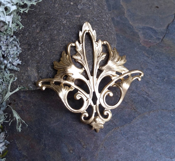 The Twisted Eye Raw Brass Stamping Fleur Made in the USA
