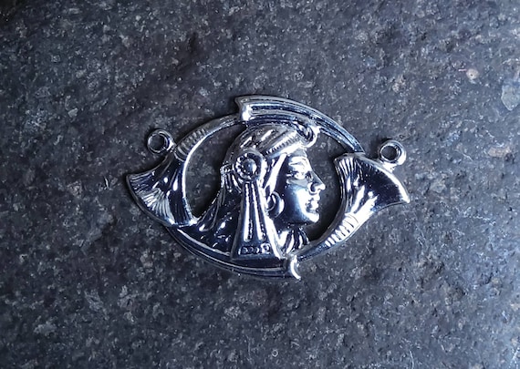 Bright Silver-plated Tiny Egyptian Figure with Holes